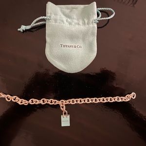 Tiffany charm bracelet with shopping bag charm